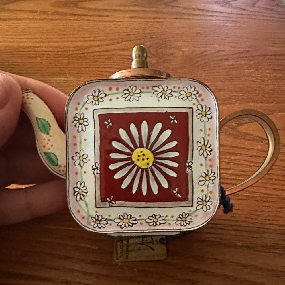 Floral Enamel Teapot with Red and White Design
Charlotte Di Vita